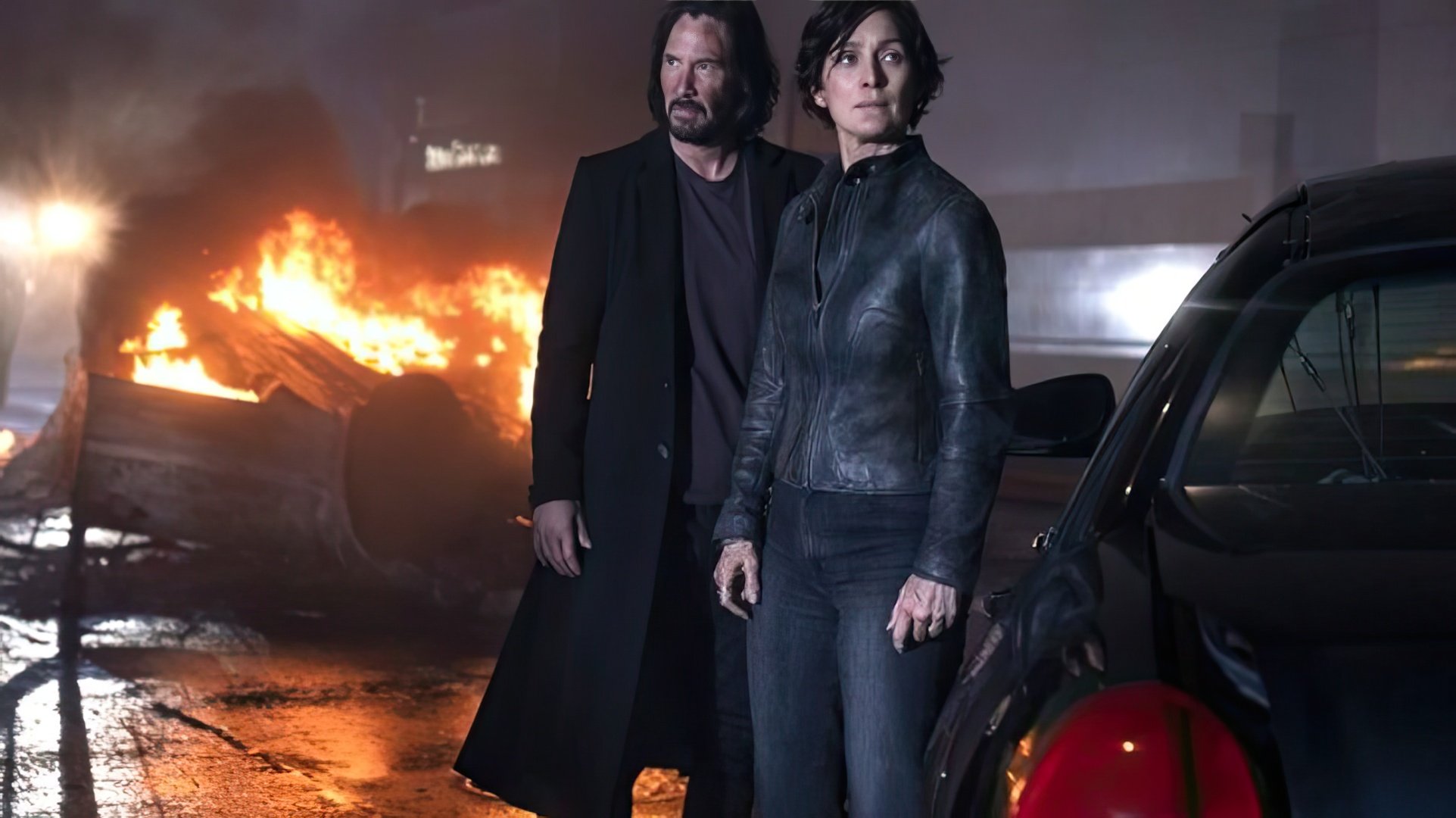 Keanu Reeves e Carrie-Anne Moss no set de The Matrix 4