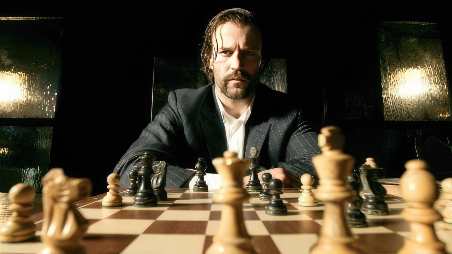 Jason Statham cabeludo ("Revolver")