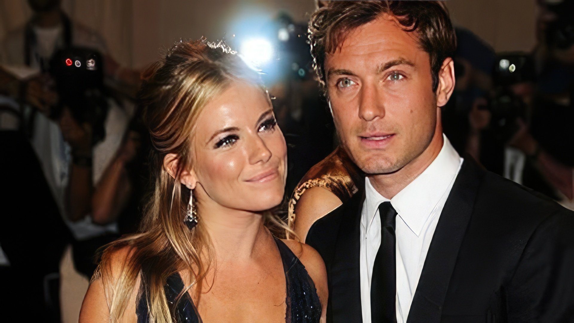 Na foto: Jude Law e Sienna Miller