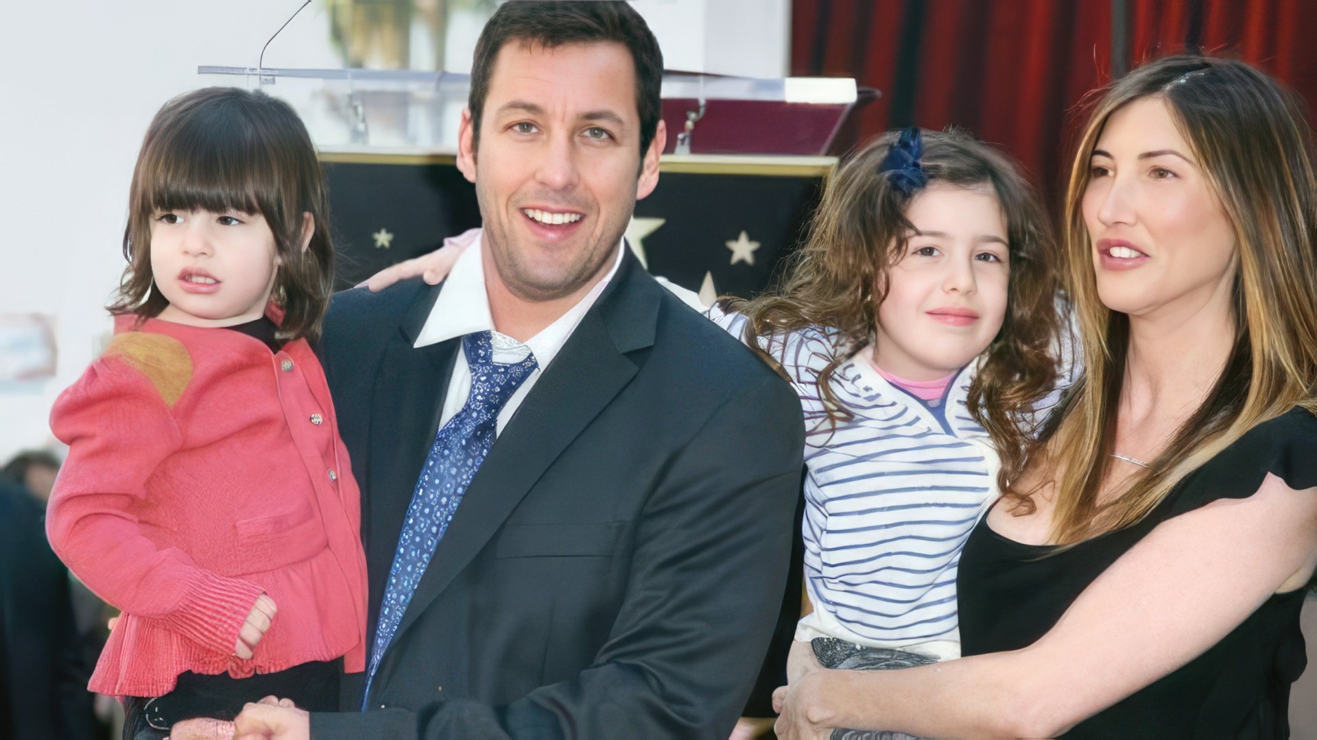 Adam Sandler com a mulher e as filhas