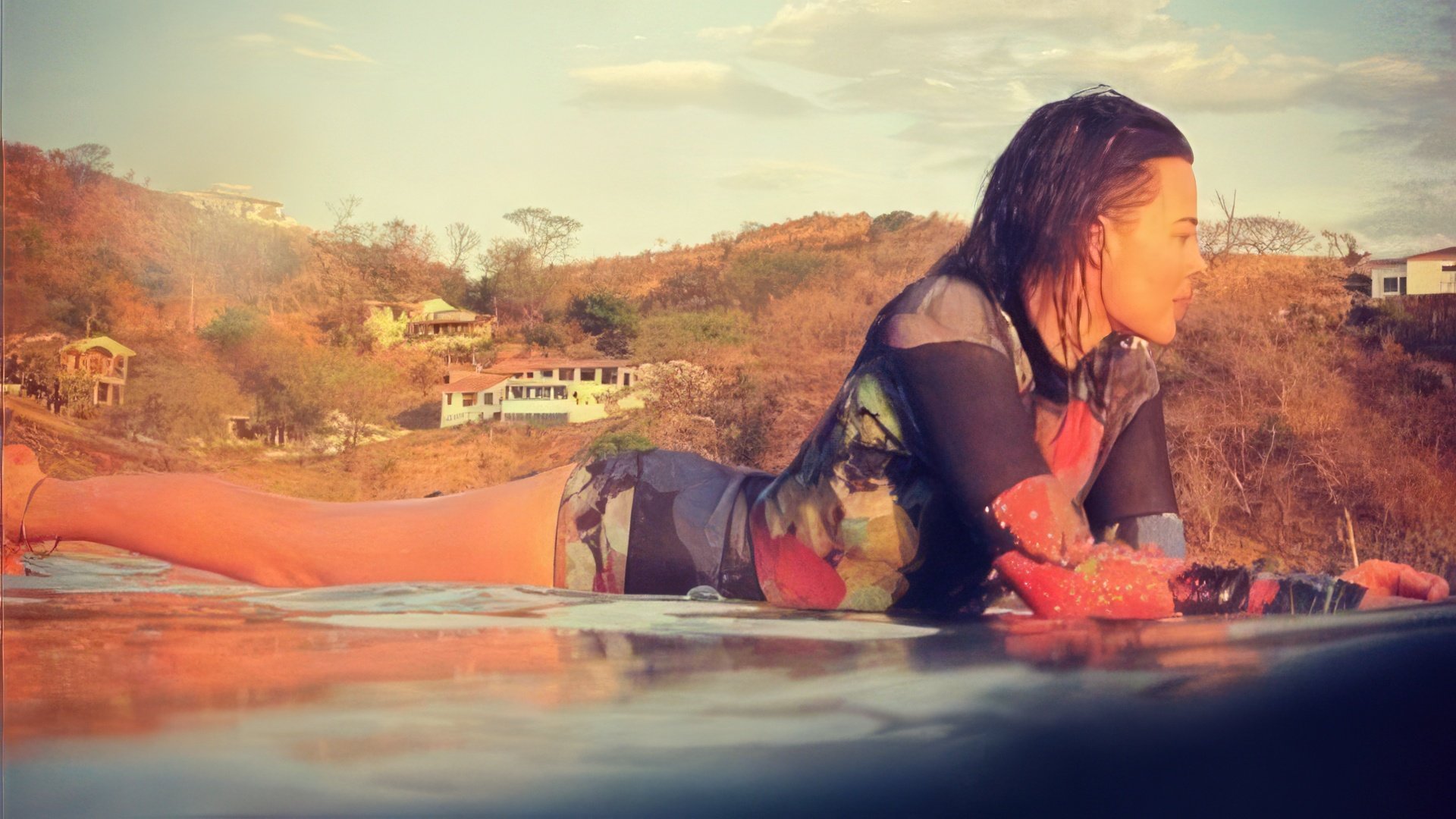 Como verdadeira australiana, Margot Robbie adora surf