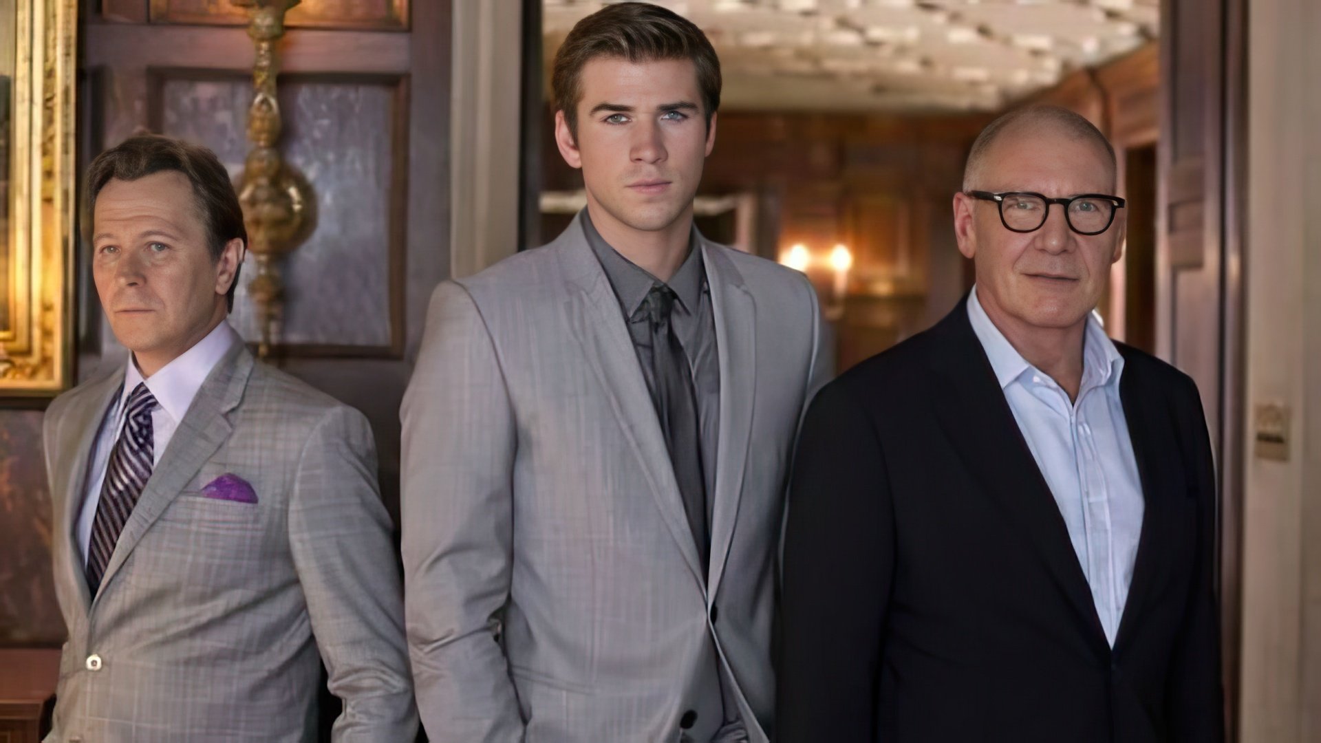 Liam Hemsworth com Gary Oldman e Harrison Ford