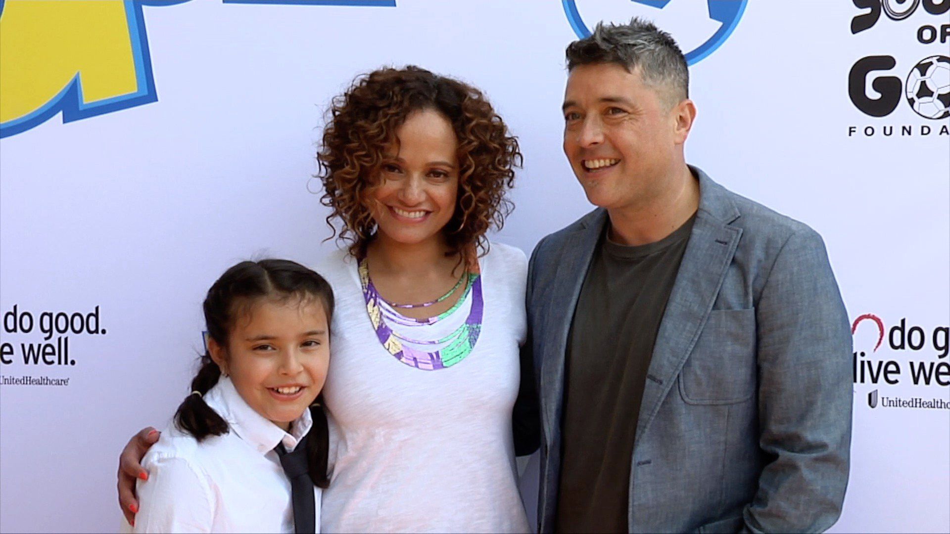 Judy Reyes, o seu marido George Valencia e a filha Leila Rey Valencia num evento social