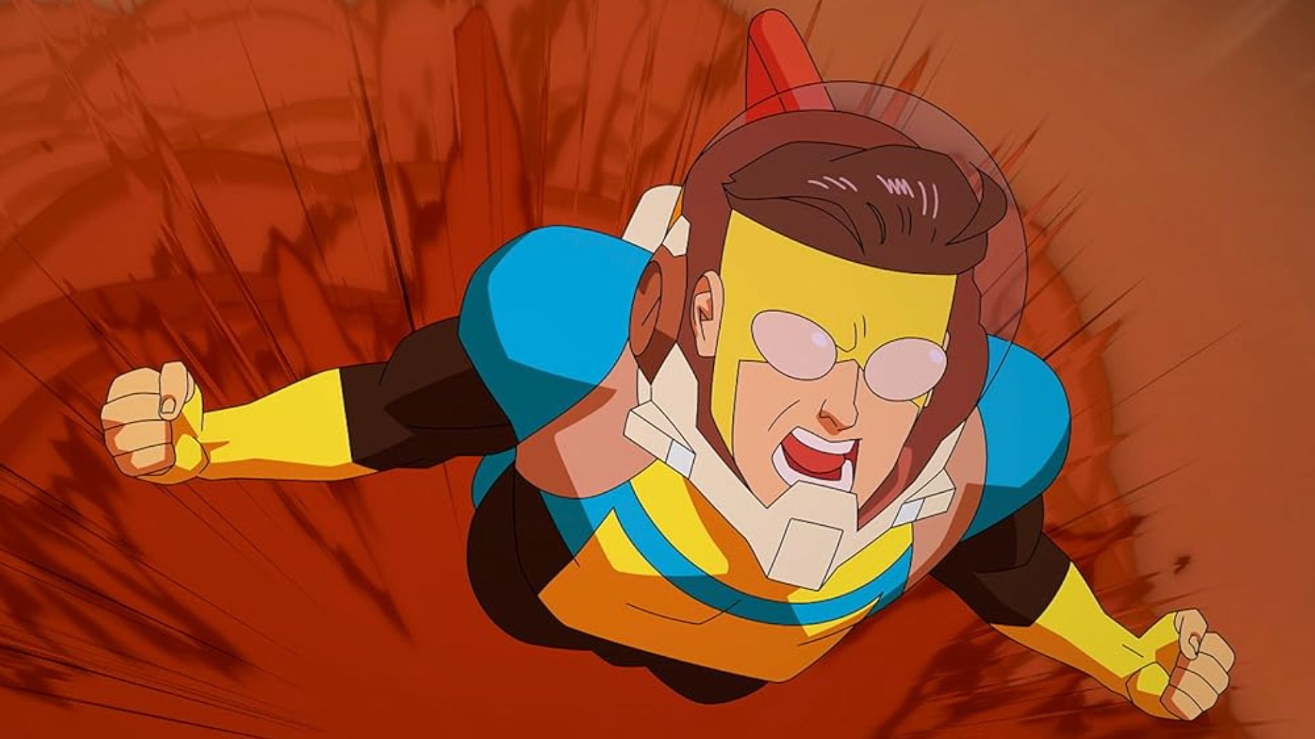 Um rapaz num fato de super-herói azul e amarelo com óculos brancos a voar e a gritar